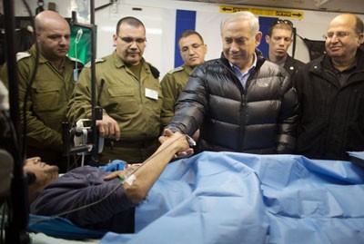 /news/18519-Syria-opposition-coalition-slams-Israel-PMs-visit-to-injured-Syrians.jpg